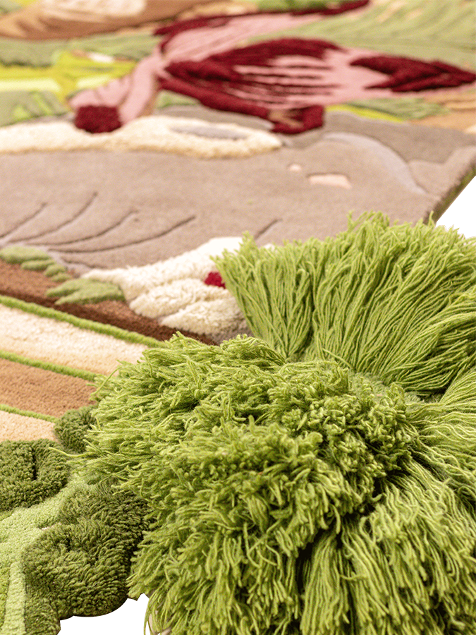 Close-up of Echoes of Hampi rug highlighting high-low pile, tactile wool detailing, and organic forms inspired by flora and fauna.