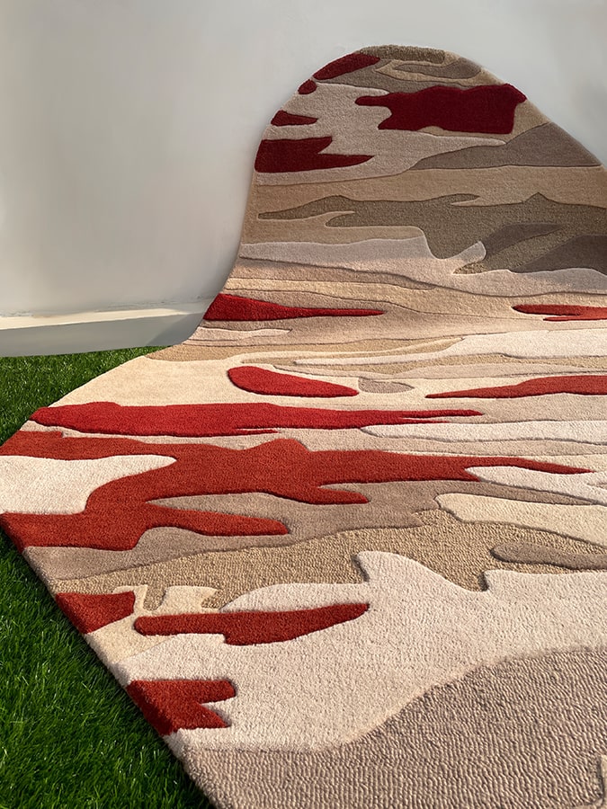 Angle view of the All a Dream Rug on a floor, illustrating the rug's plush texture and depth with natural lighting.