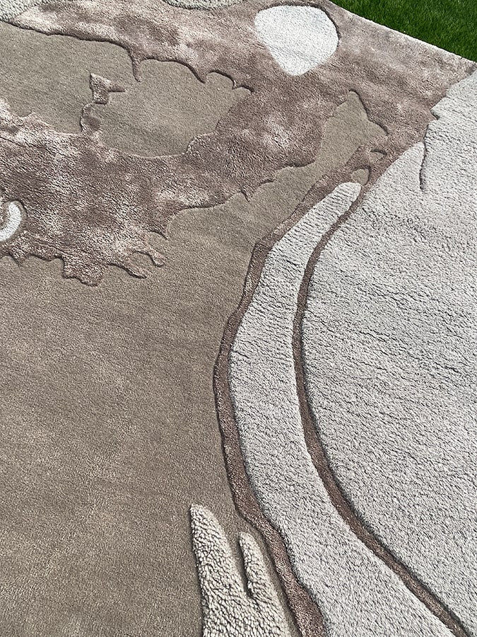 "Close-up of the Dove Rug's texture, highlighting the luxurious blend of New Zealand wool and viscose.