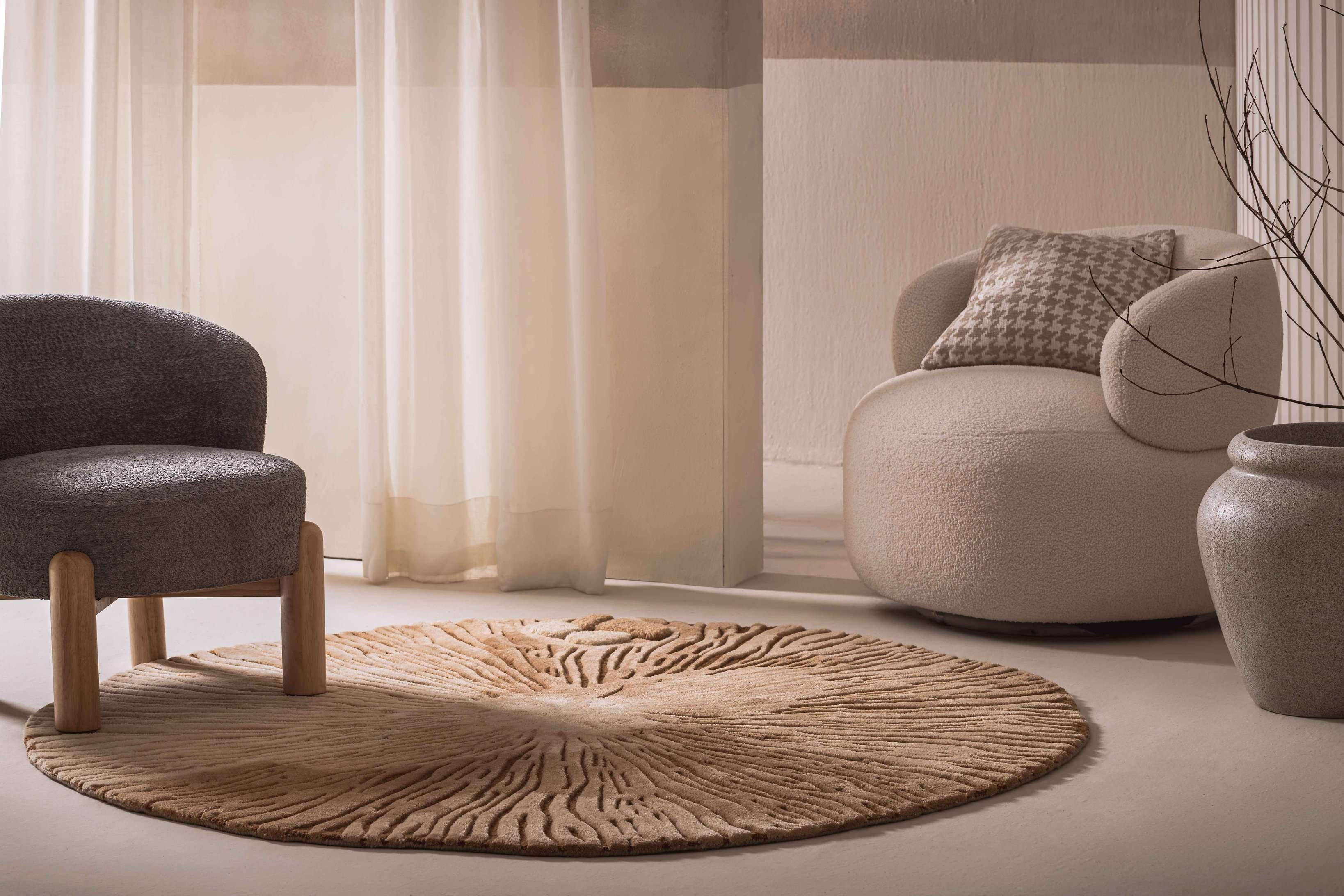 Earth’s Pulse textured rug featuring radial lines inspired by mushroom gills, in warm earthy tones, hand-tufted with intricate detail.