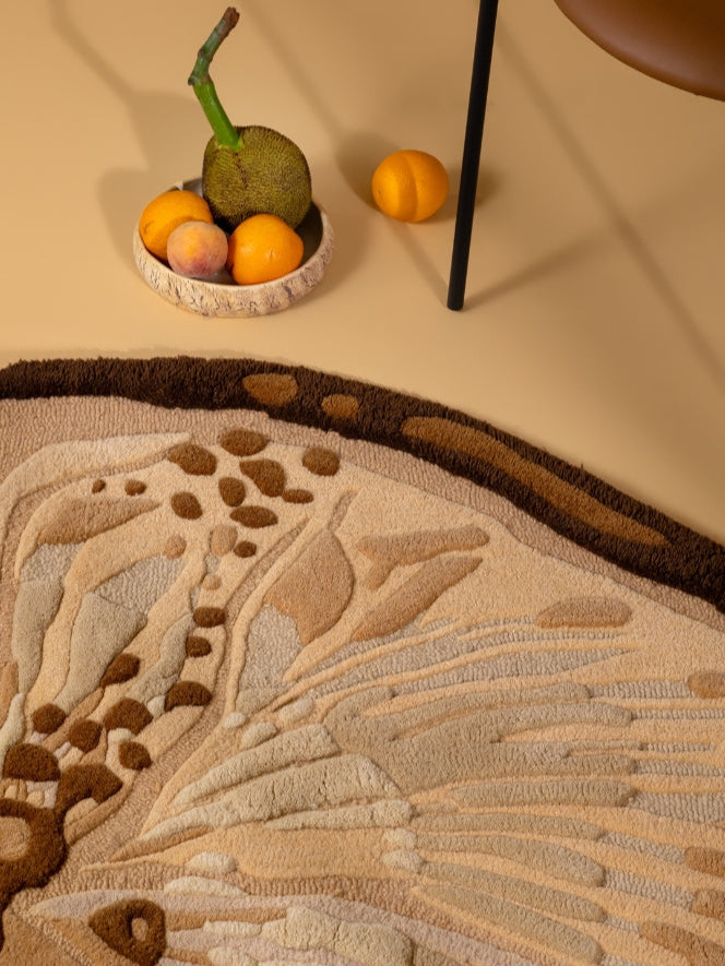Close-up of Honey Ripple textured rug showcasing hand-tufted layers and organic patterns.