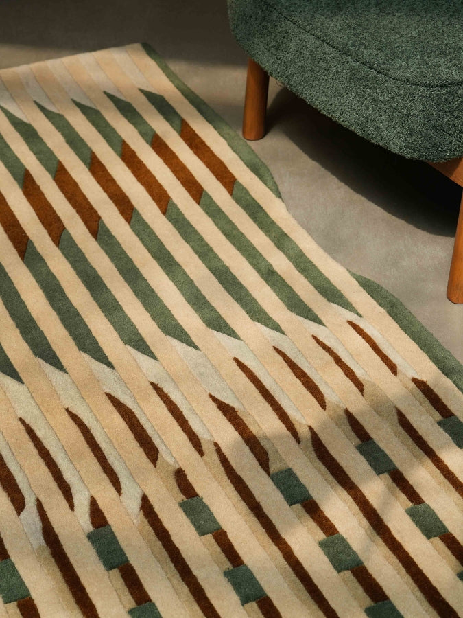 Close-up of Line of Thought rug showing layered hand-tufted textures and sculptural high-low pile.