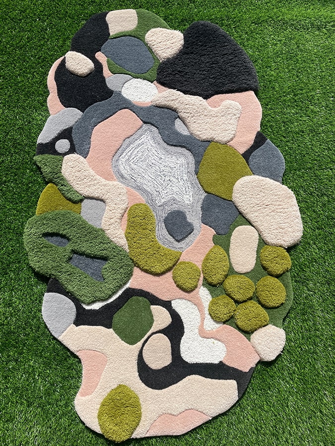 Lush with Moss Rug showcasing its rich, soft texture and varied pile heights, inspired by the natural beauty of moss.