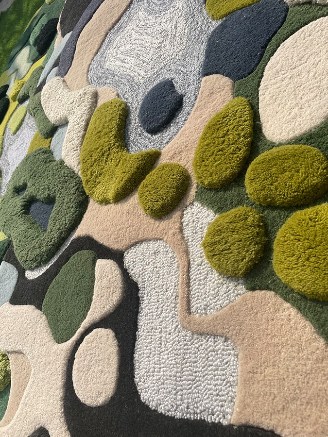 Close-up of the Lush with Moss Rug, highlighting the luxurious New Zealand wool and the intricate high-low pile detail.