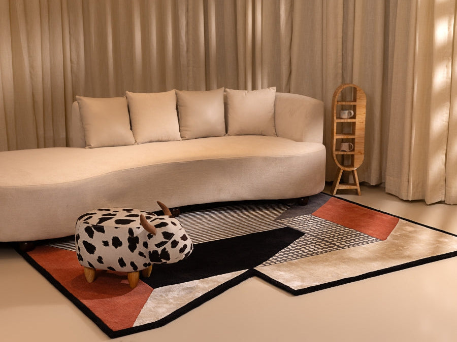 Close-up of Mosaic Groove Tangerine rug highlighting its hand-tufted textures and contemporary color palette.