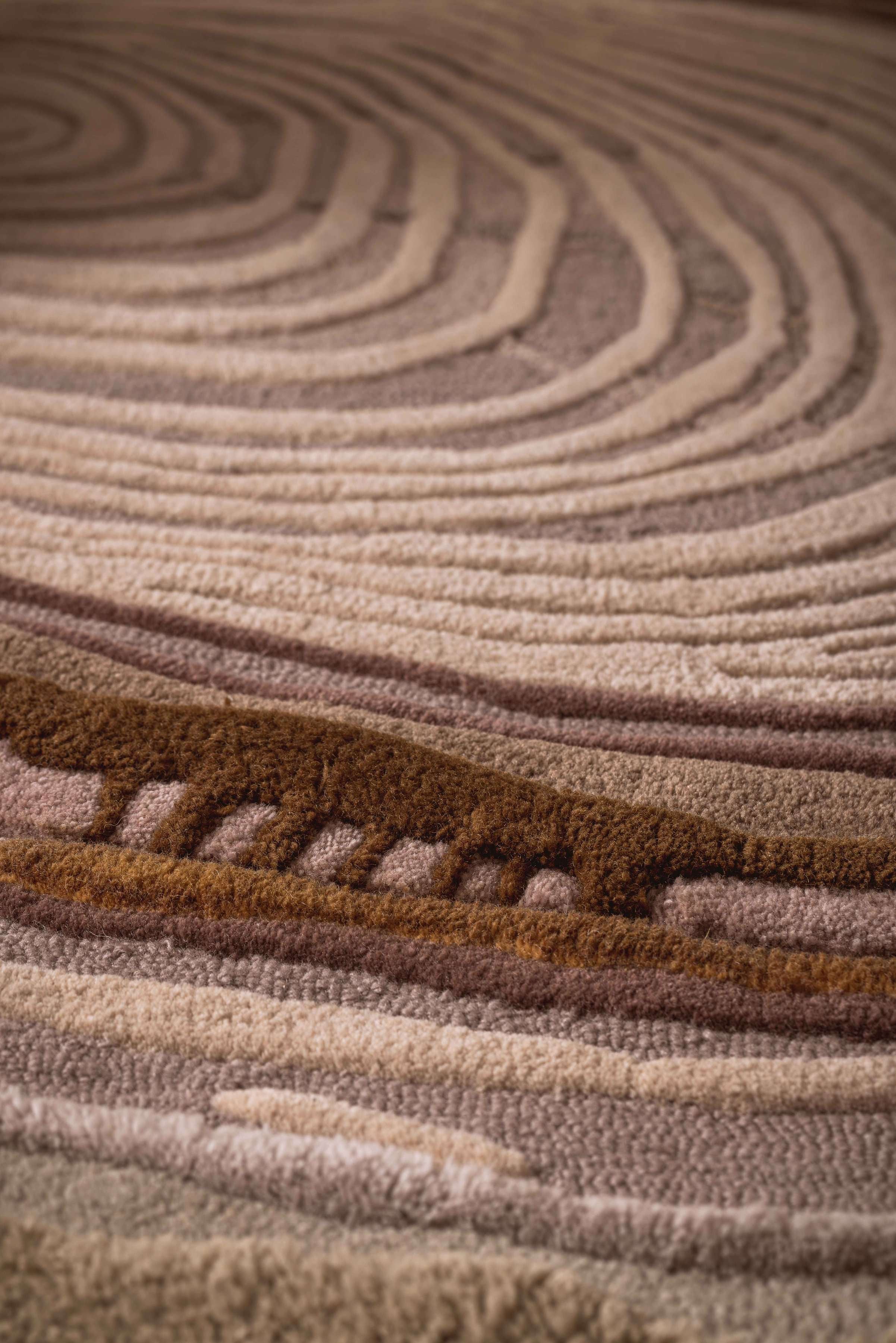 Close-up of Nature’s Carve textured rug showcasing its layered earth-inspired design, highlighting hand-tufted craftsmanship.