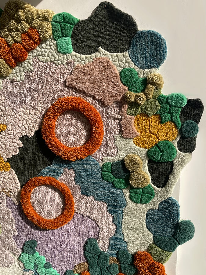 Detail shot of the Oasis Rug, highlighting the texture that mimics an oasis of hope, bringing a piece of the outdoors inside.