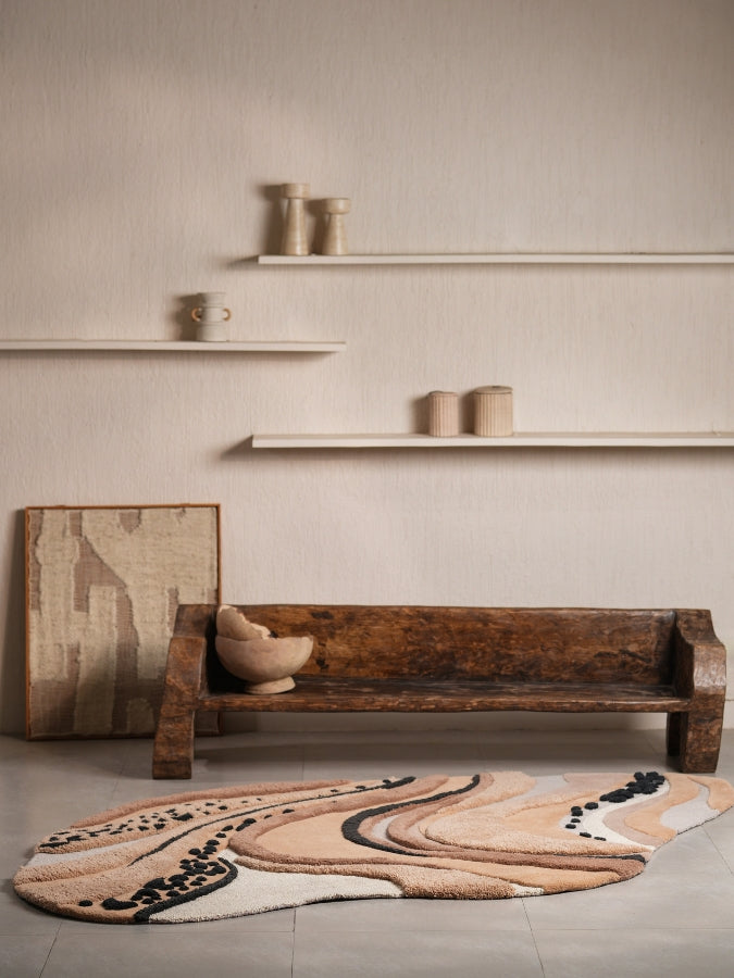  Sandstorm rug styled in a rustic-modern space, adding sculptural elegance and desert tones.

