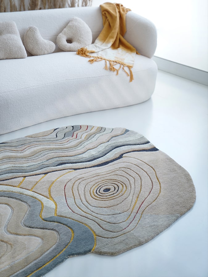 Close-up of the Shifting Sands Rug, highlighting the delicate interplay of colors that represent the dynamic beauty of desert sands.