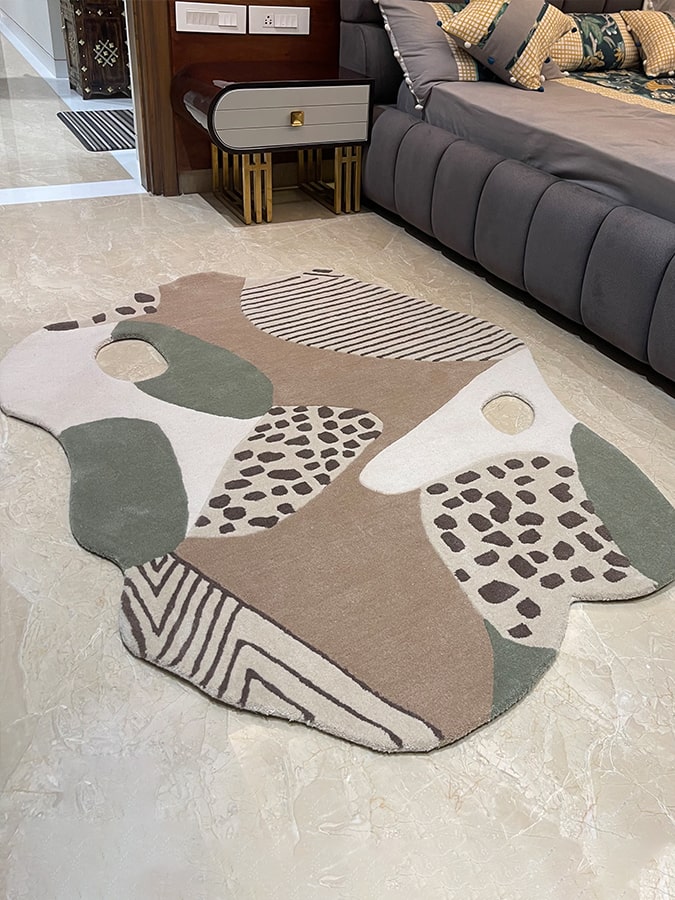 Stone Quarry Rug placed in a room, showing how its natural hues bring a serene and grounding atmosphere to living spaces.