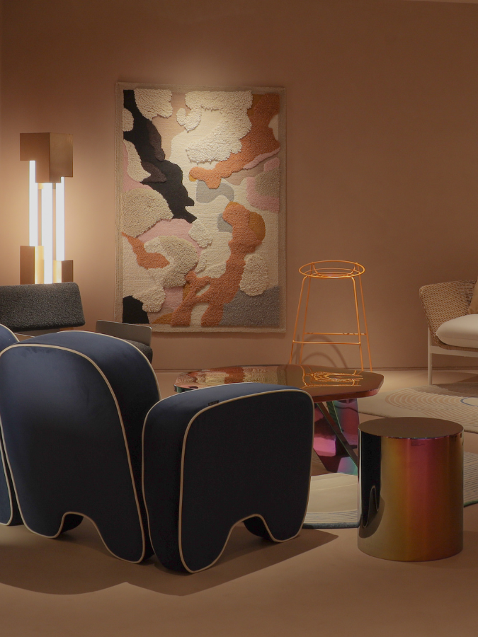 Stone & Sienna wall rug with warm sienna, cream, black, and grey organic abstract shapes.