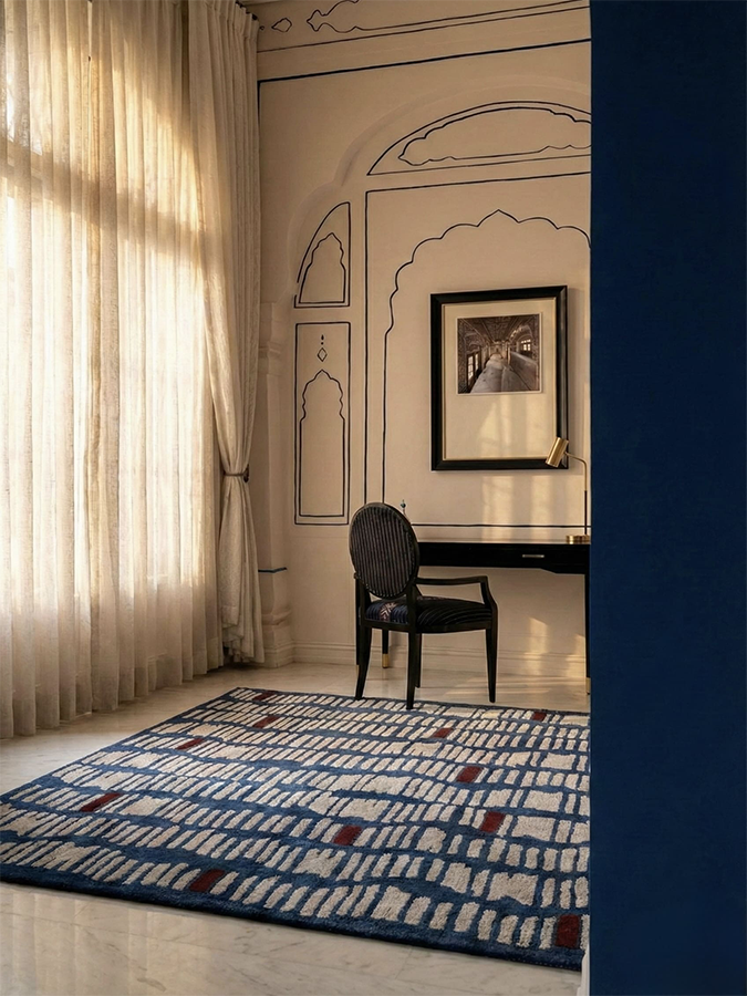 Tactile Code rug placed in a refined architectural setting, enhancing the room with structured pattern and modern warmth.