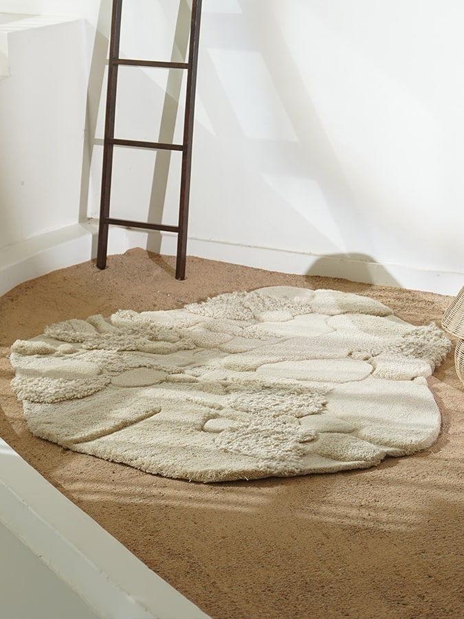 Textured Terrain Rug showcasing its minimalist abstract design and soft texture, inspired by the natural warmth of deserts and mountains.