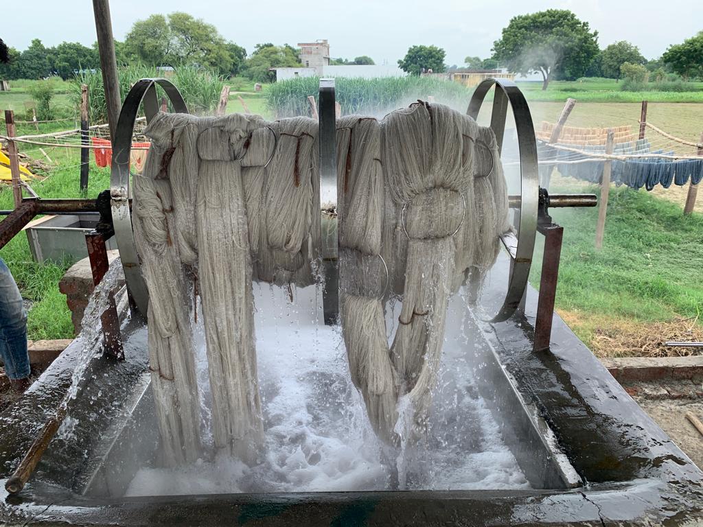 Thread washing before rug making