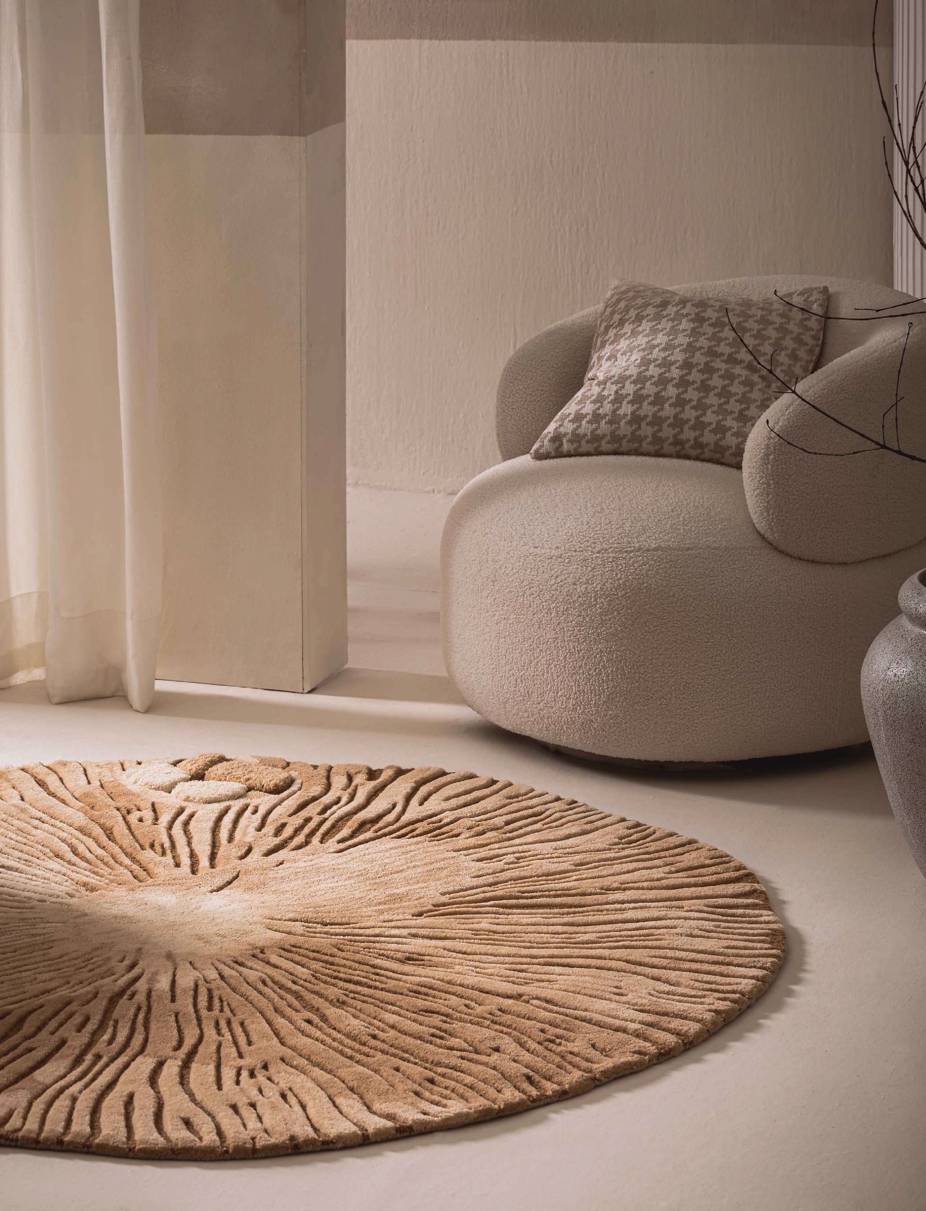 Earth’s Pulse Hand Tufted Rug in warm earthy radial lines inspired by mushroom gills