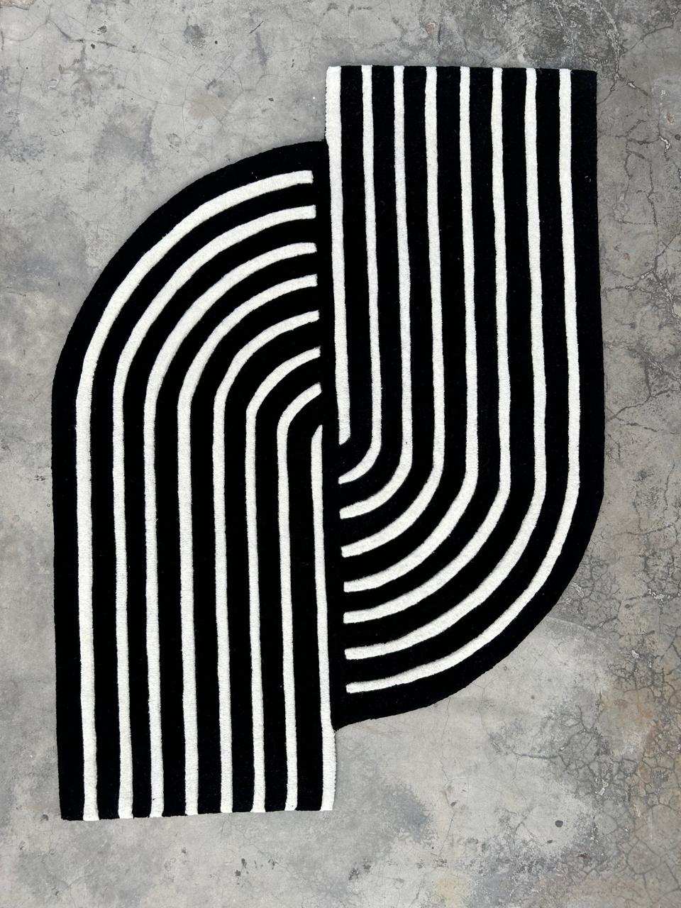 Movement Hand Tufted Rug in abstract flowing design