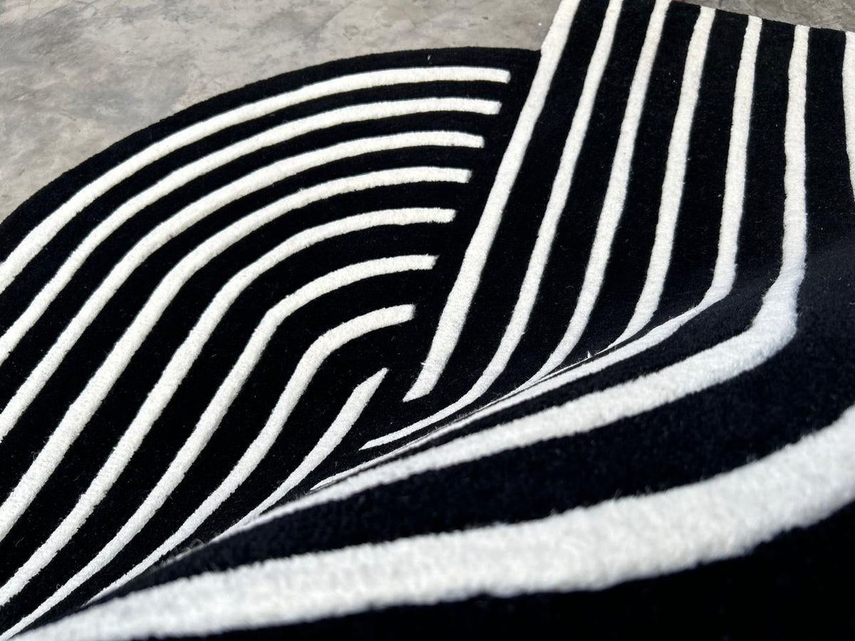 Movement handmade rug by Loops by LJ, abstract flowing design