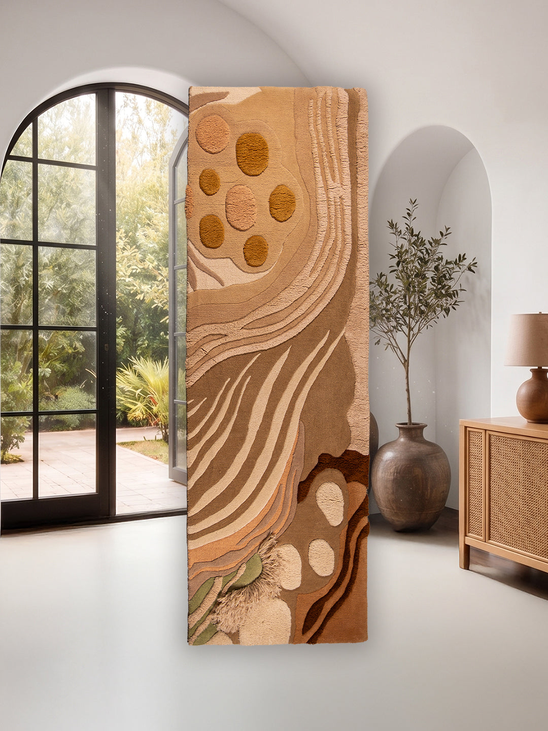 Desert Bloom hand-tufted rug in ochre, taupe, sage green, and brown, inspired by desert landscapes and crafted from 100% New Zealand wool.