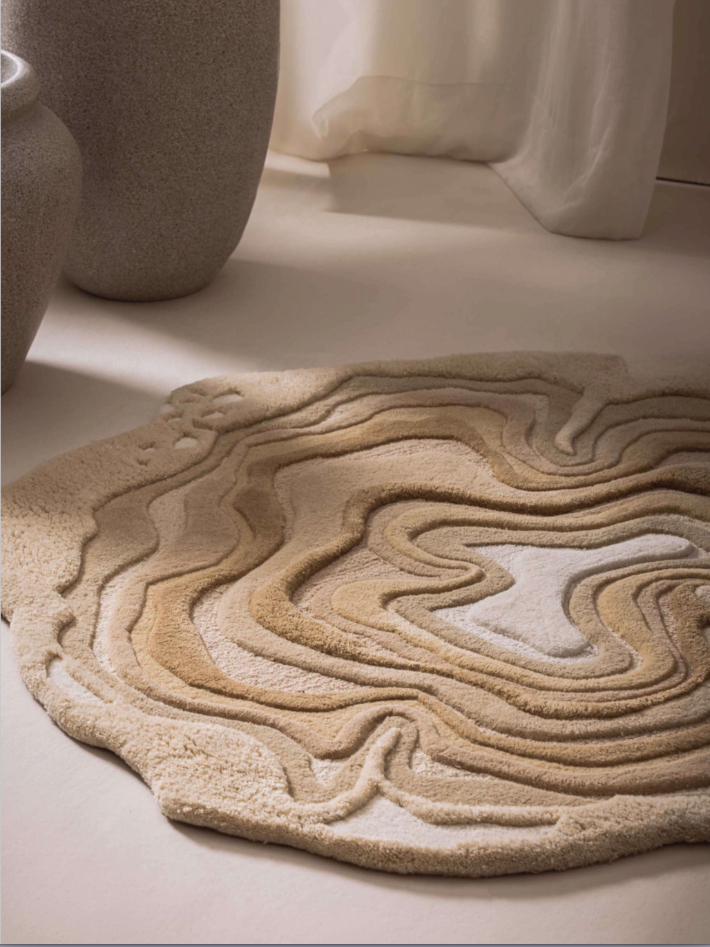 Shifting Dunes Hand Tufted Rug in tonal earthy hues inspired by wind-shaped dunes